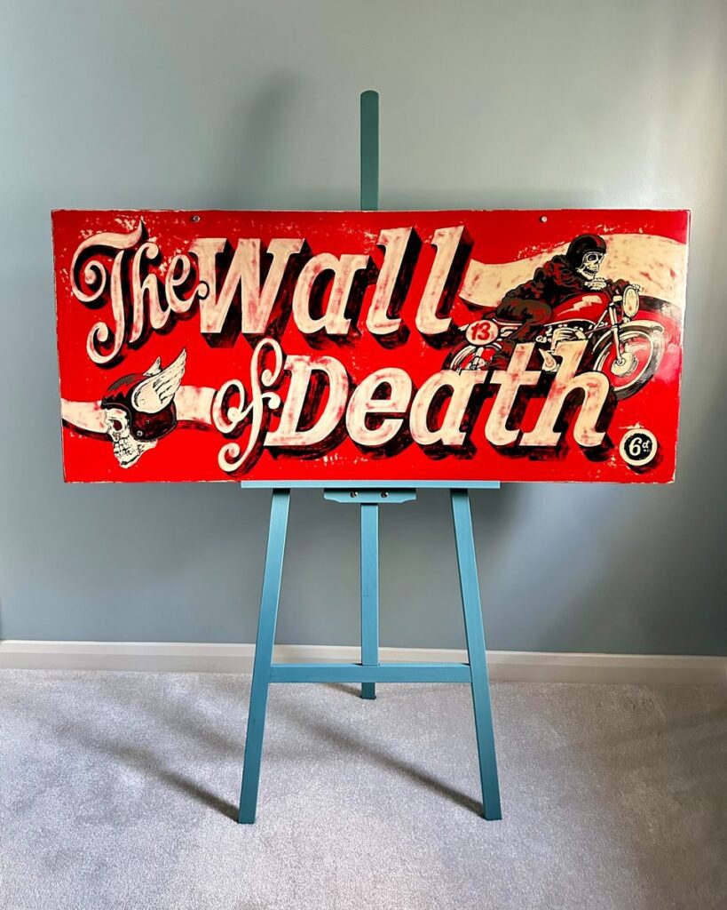 Full display view of Red Wall of Death sign artwork by artist Leigh Kelsey